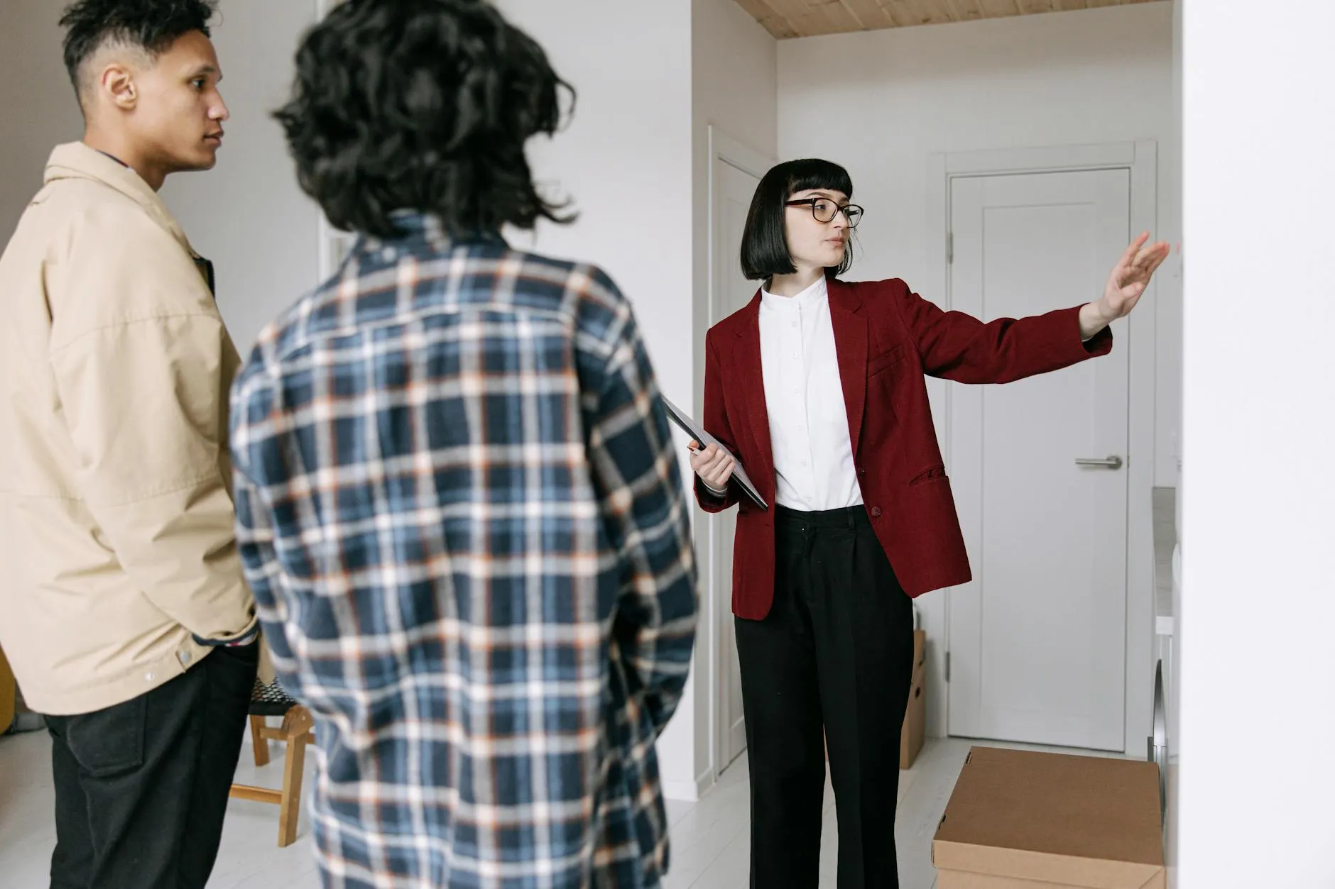 Real estate agent meeting with home-buyer clients