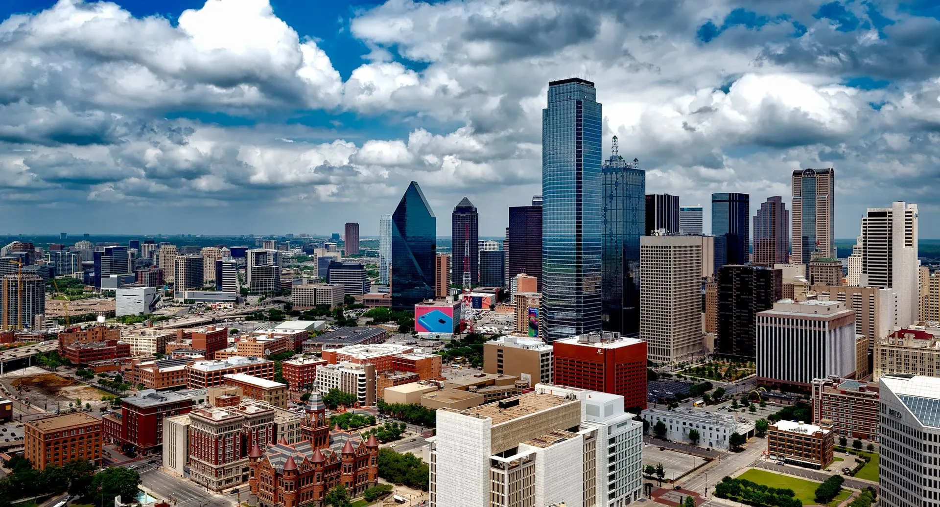 Downtown Dallas skyline on a partly cloudy afternoon